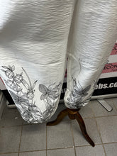 Load image into Gallery viewer, White &amp; Black Floral Hem Pants

