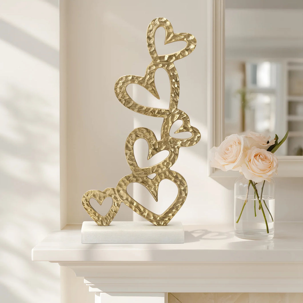Stacked Gold Hearts on Metal Base